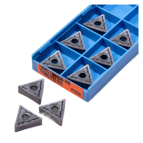 Check Out These 10 Pc Indexable Carbide Lathe Tools With Tough TNMG160408 Inserts And A Super Sharp Edge That Rocks On Stainless Steel Plus Heavy Duty Hard Alloy Turning Blades For All Your Metal Fabrication Jobs. Set of TNMG332-HA carbide inserts in a blue box.