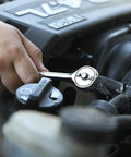 Ultra Precise Gearless Ratchet For Tight Spaces With One Half Inch Drive, Nickel Plated High Carbon Steel in use on car engine
