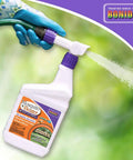 Gloved hand spraying Mosquito Beater 32 Ounce Ready To Spray Insect Repellent That Kills Mosquitoes Flies And Ticks For Long Lasting Outdoor Control
