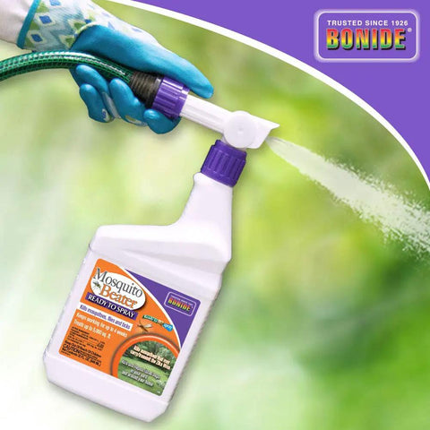 Gloved hand spraying Mosquito Beater 32 Ounce Ready To Spray Insect Repellent That Kills Mosquitoes Flies And Ticks For Long Lasting Outdoor Control