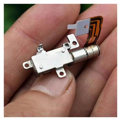 Tough As Nails 8Mm Travel Planetary Gear Stepper Linear Actuator Driven By 24V DC Power with connection cable in hand.
