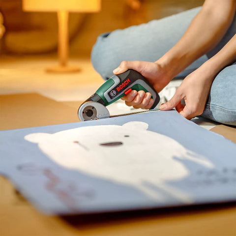 Hecka Heavy Duty Power Drill Cutting Adapter Slick Six Millimeter Blade in use for trimming blue cardstock with a polar bear design.