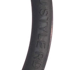 Close-up of round black rubber belt for Sanitaire and Eureka upright vacuums, showing the embossed texture.