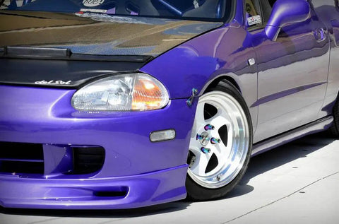 Purple car with Universal Quick Release Fastener Kit With Neo Chrome Finish For Bumpers, Trunks, Fenders And Hatches, Fits Most Cars From JDM To American Muscle, Multi Color Anodized Aluminum Hardware visible on front fender.