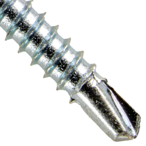 Close-up of Six X One Point Four Inch Bugle Head Drywall Screws For Metal Studs With Phillips Drive And Self Drilling Tip.