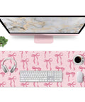 Large Pink Bow Desk Mat For Women 31.5 Inch Non Slip Keyboard And Mouse Pad With Stitched Edge displayed on desk