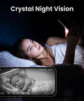 Woman using Indoor 2K Security Cam With 360 Degree Pan Tilt, WiFi Home Surveillance to monitor baby on smartphone with night vision.
