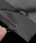 Close-up of 100 Pack No Brainer Clear BOPP Self Sealing Bags For Snacks Candy Baking with resealable opening being peeled open