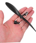 Hand holding black plastic propeller from 10 Pack RC Airplane Propeller Set With 6x4mm Hole Diameter Fold Resistant Plastic Blades