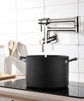 Stainless Steel Pot Filler Faucet Wall Mount With Dual Joint Swing Arm, Cold Water Only, Double Lever Handle, 23.4 Inch Kitchen Stove Faucet, Low Lead Brass Body, Heavy Duty Workhorse filling a pot.