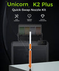 K2 Plus 0.4mm Quick Swap Nozzle Set For 3D Printer with Creality printer in background, showcasing copper alloy design