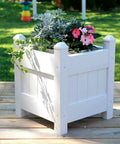 Maintenance Free Vinyl Outdoor Planter Box 16 Inch Square 19 Inch High With 2x2 Leg Supports And One Point Five By Four Rails Hardware Included Made In USA Stackable For Expanding Patio Garden Weather Resistant Construction For Year Round Outdoor Use, white planter on deck