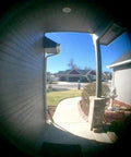 View through Solid Brass Door Peephole With 220 Degree View And Heavy Duty Rotating Privacy Cover For One And Three Eighths To Two And A Quarter Inch