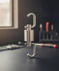 Heavy Duty Stainless Steel Swivel Rotation Joint Goes Like Butter For Dockside Hoists Workshop Rigs And Nautical Gear No Sweat Rust Proof Connector Fits Size Two Tubing on a workbench.