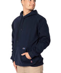 Hella Comfy Mens Flame Resistant Hoodie Sweatshirt With Heavyweight 12 5 Oz Fleece Pullover For Tough Industrial Job Site Work Wear Navy Cotton Acrylic Blend Meets Nfpa Atptv Hrc Safety Specs Xl Regular, model standing.