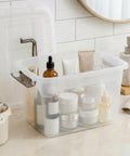 4 Pack 6 Qt Clear Storage Bins With Lids And Grey Handles Stackable Plastic Bins For Organizing Toys Pantry Kitchen Garage Closet And More Great For Sorting Toys Crafts Photos Medicine And Snacks In Any Room Like A Pro, filled with assorted bottles on a countertop