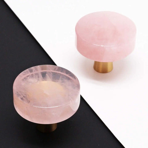 Pink Rose Quartz Cabinet Knobs 2 Pack with Brushed Brass Base on black and white background