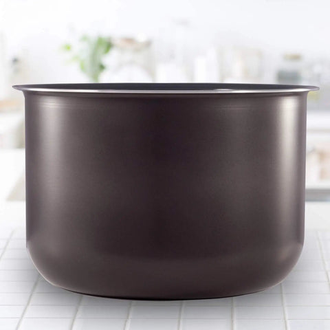 Ceramic Inner Pot For 6 Quart Multicookers, Nonstick Coated Interior, placed on kitchen countertop