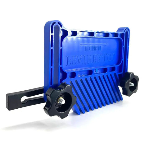 Workhorse Stackable Featherboard Rig For Table Saw Router And Bandsaw With Tight Lock Anti Kickback Bar T Track Mount Blue Grip Handles No Sweat Setup close-up of blue plastic featherboard with black knobs and t-track attachment.