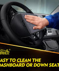 Front view of grey HOMEXCEL microfiber cleaning cloth wiping a car steering wheel