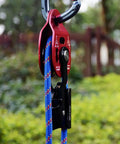 Self Locking Pulley With Progress Capture Swing Side For Heavy Hauling And Lifting System Aluminum Alloy Wheel 400 Kg Load 25 KN Breaking Strength Ball Bearings 8 To 12 Millimeter Rope Compatibility 18cm By 7.5cm Anodized Finish Black, red pulley on rope