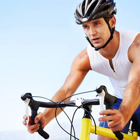 Cyclist gripping lightweight 7075 aluminum road bike handlebars thirty one point eight millimeter clamp 420 millimeter drop bars with horns.