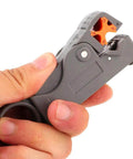 Hand holding Coaxial Cable Stripping And Crimping Tool With Adjustable Two Blade Knife, Compatible With 4 5 6 And 7 Coax Cables