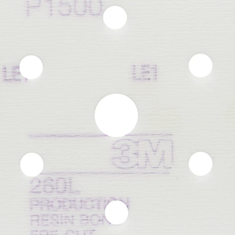 Close-up of Hookit Finishing Film Abrasive Disc 260L P800 Aluminum Oxide Pro Grade, showing 6-hole design for dust control.