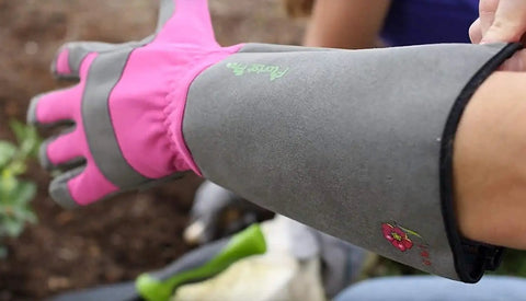 Side view of Rose Pruning Gardening Gloves For Women With Long Sleeve Cuff, Thorn Resistant, Padded Palm, Pink and grey color.