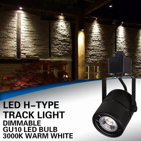 Go-To 10W H Type LED Track Light Heads 24 Degree Beam CRI 90 Dimmable 3000K Warm White 120V Halo Style Fixtures For Retail Art And Accents Black Finish 12 Pack shown illuminating exterior brick wall.