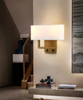 Antique Finish Wall Sconce Lights Set Of Two With White Textile Shades And On Off Switch in modern living room setup