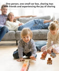 Game Changing BPA Free Silicone Toy Train For The Kiddos Push And Pull Stacking Blocks in use with children on a floor.