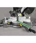Close-up of 10 Inch Sliding Compound Miter Saw with Adjustable Laser Guide, Double Bevel, showing electric brake and speed control.