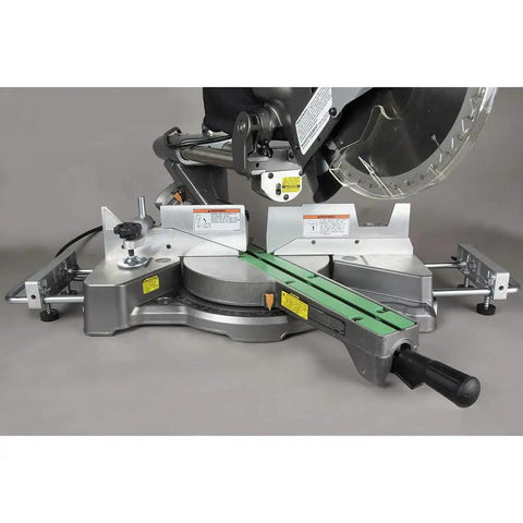 Close-up of 10 Inch Sliding Compound Miter Saw with Adjustable Laser Guide, Double Bevel, showing electric brake and speed control.