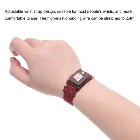 Person wearing maroon red anti static wrist strap from 3 Pack Anti Static Wrist Strap Set, ESD Safe Grounding Bracelet With Adjustable Strap.