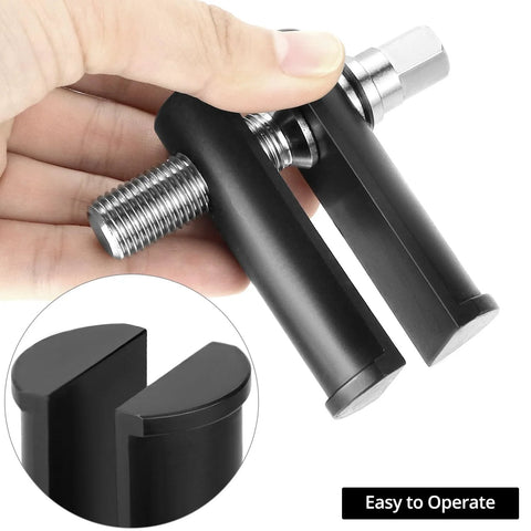 Person holding a Bearing Removal Tool And Neck Bearing Race Remover For Motorcycle Neck Bearings showing 1-1/8 to 2-5/8 inches fit
