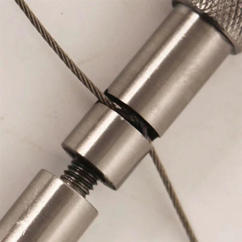 Manual Camping Rope And Dehorning Wire Tool for Animal Handling, close-up of stainless steel wire and handle connection.