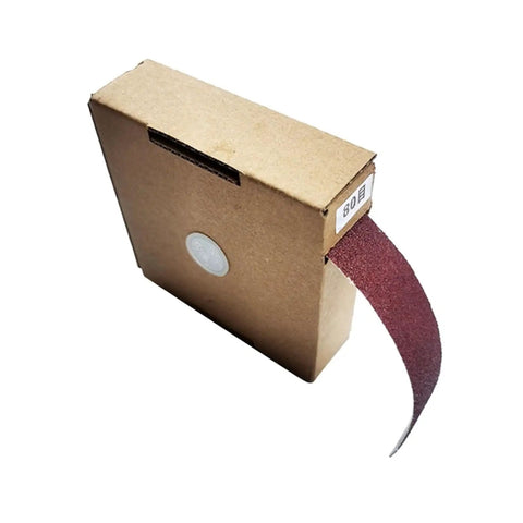 Top Shelf Sandpaper Rolls Built For Woodworking And Metal Polish Boasting Clog Proof Open Weave Texture Plus Grits From Eighty To Six Hundred Solid For Drum Machines And Hand Blocks Delivering Bang For Your Buck Performance You Can Quick Cut Now in a cardboard box with exposed sandpaper.
