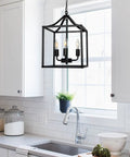 Plug In Black Farmhouse Pendant Chandelier With Dope Industrial Rustic Vibe 3 Light Fixture On A 16.8 ft Hanging Cord in kitchen