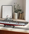 Epic USS Enterprise Aircraft Carrier Model Kit With 1883 Building Blocks displayed on a shelf, realistic warship design.
