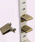 Built Tough Adjustable Steel Pilaster Shelf Clip Brackets with Dead Simple Slide Mount and Smooth Galvanized Coating for Any Standard Wood or Metal Shelving Rack System Bronze, detail view of a bracket.