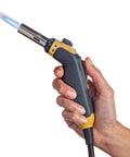 Hand holding Pro Grade Precision Flame Hand Torch With Adjustable Heat for MAP Pro Propane Fuel, displaying blue flame