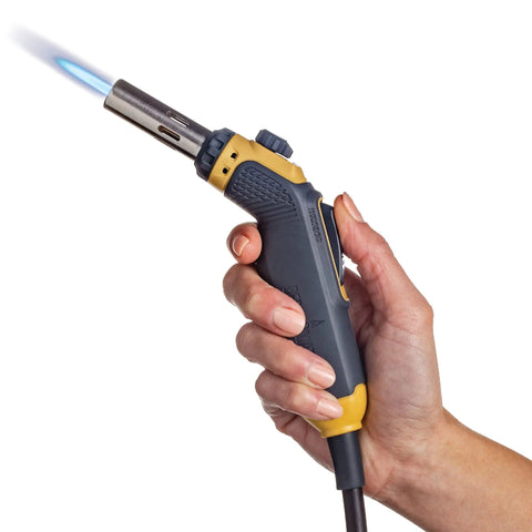 Hand holding Pro Grade Precision Flame Hand Torch With Adjustable Heat for MAP Pro Propane Fuel, displaying blue flame