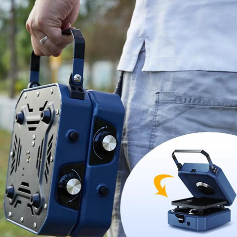 Person holding Beefy Two Burner Camp Stove With Foldable Griddle, Portable 24000 BTU Propane Stove For Camping.