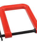 Massive 110mm Jaw G Clamp With Deep Throat For Welding And Woodworking Projects Made From Durable Cast Iron Rust Resistant Orange Finish Heavy Duty C-Clamp For Gluing And Assembly Tasks No Sweat Guarantee, showing the clamp from a side angle.