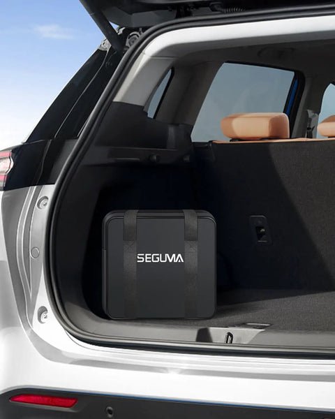 Heavy Duty Level 2 Ev Charger For Tesla With Nacs Cord And Nema 14-50 Plug At Forty Amps inside car trunk.