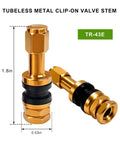 Two gold tubeless metal clamp in valve stems for 0.453 inch rim holes, shown with dimensions, rubber gaskets, and aluminum alloy build.