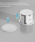 Slick Flush Mount Pop Up Socket Drops Straight Into Countertops Featuring Qi2 Magnetic Wireless Charger With 65W Fast Charging Double Usb Ports Zero Hassle Setup In Fresh White showing usage instructions for the pop up mechanism.