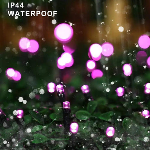 Close-up of Purple 66 Foot 200 LED String Lights With 8 Modes for indoor and outdoor use, in the rain, showing IP44 waterproof rating.