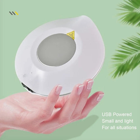 Solid Desk Companion Electric Beverage Warmer Keeps Your Morning Brew Piping Hot With Dead Simple USB Powered Convenience in hand